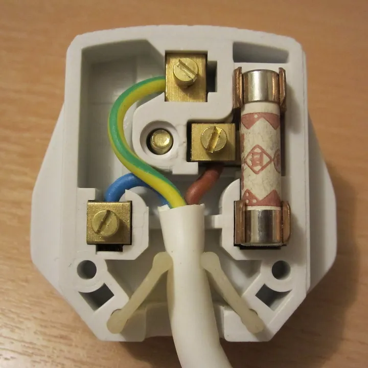 Inside a rewireable BS 1363 plug, showing the cartridge fuse